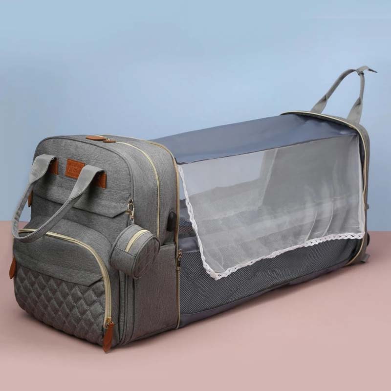 Sac a langer nomade transformable en lit